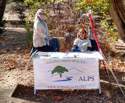 Deborah and Carol greet volunteers and hikers!